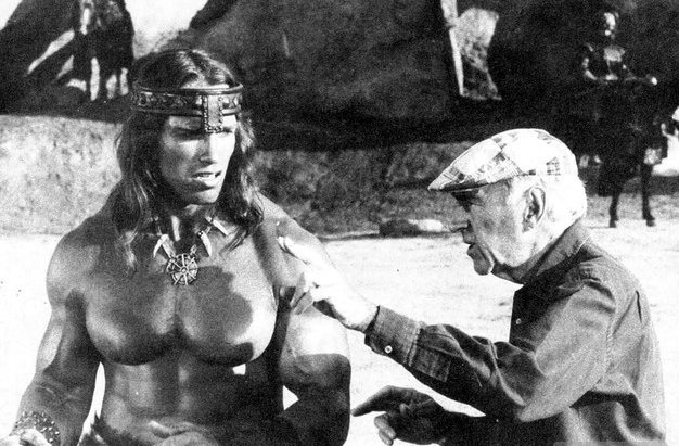 Richard Fleischer directing Arnold Schwarzenegger in Conan the Destroyer, 1984. Not quite a film film the quality of 20,000 Leagues. 