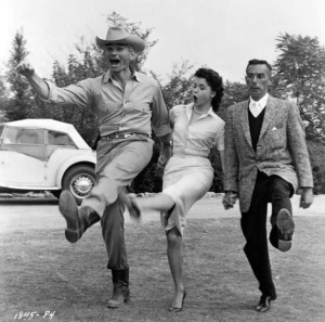 Jeff Chandler, Colleen Miller and Jack Arnold doing a little dance on the set of Man in the Shadow in 1957. 